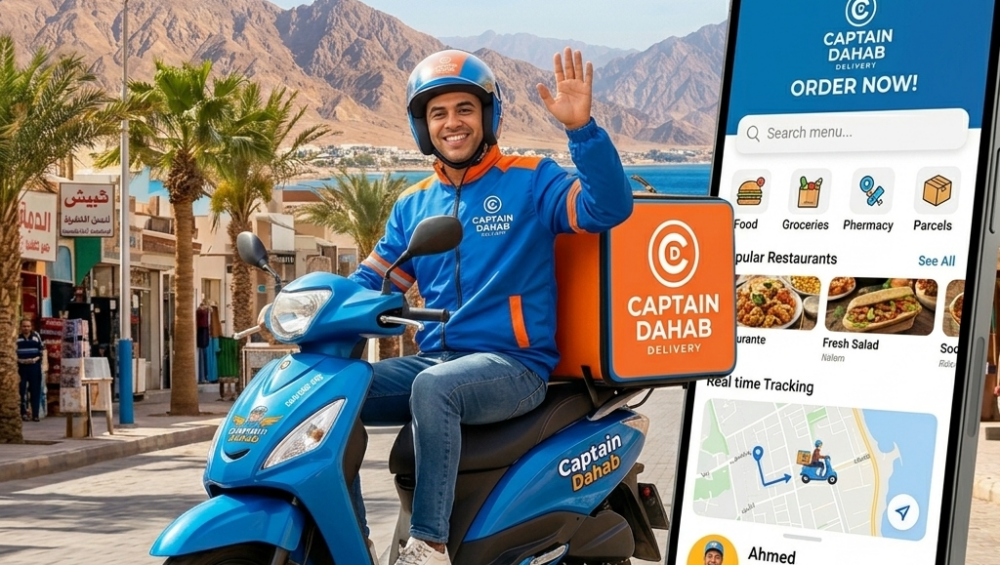 Captain Dahab Delivery App rider on a blue scooter in Dahab with the official orange logo, mountains, and Red Sea background